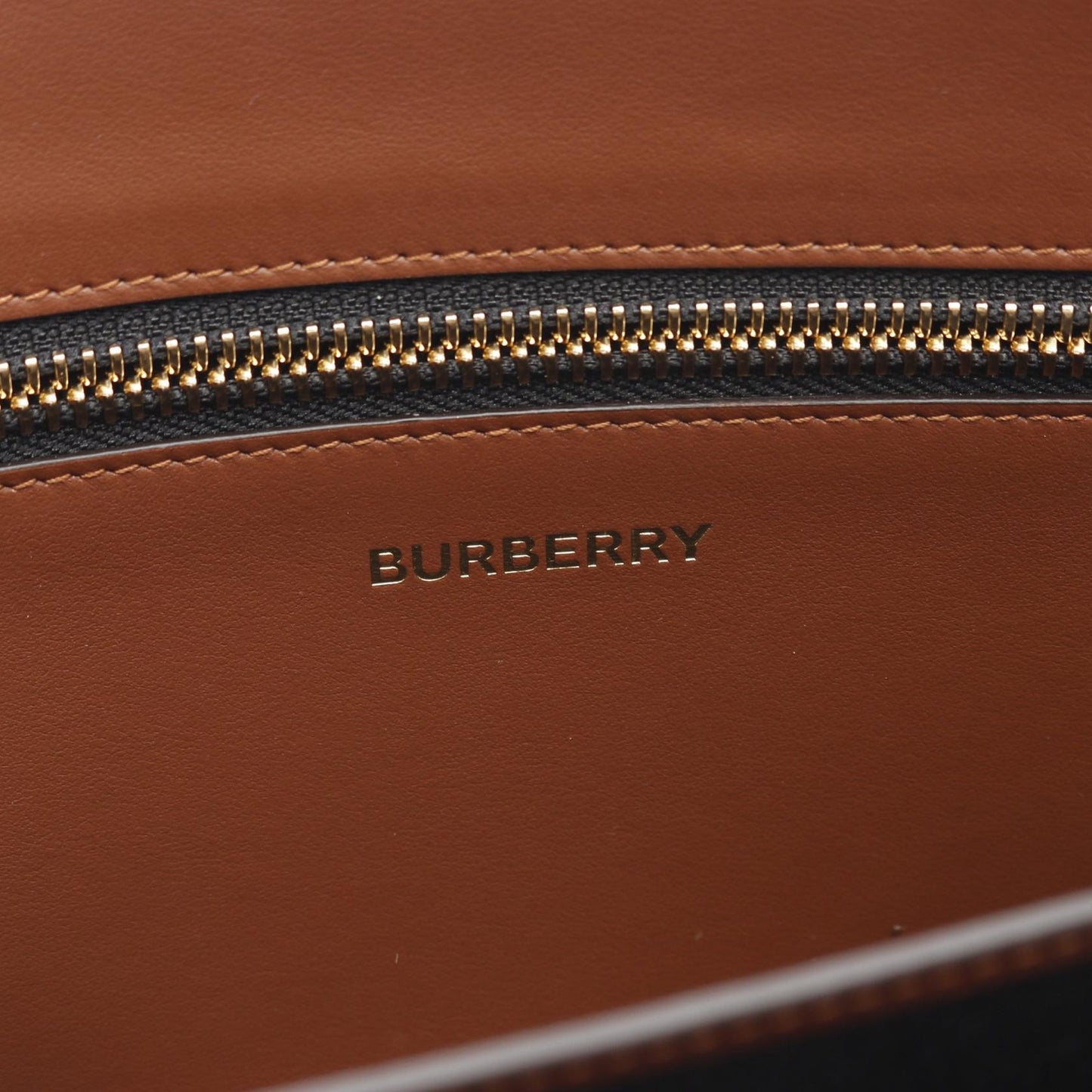 Burberry Coated Leather Clutch Bag