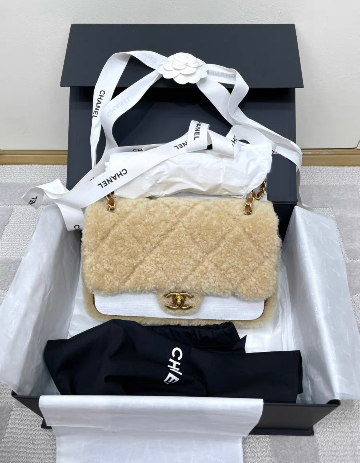 Chanel 24 Flap Bag Shearling Lambskin Gold-Tone Metal Beige Brown Rovelle Bags