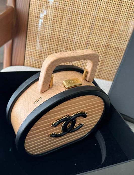 Chanel Round Cc Vanity Case Beechwood And Black Lambskin Gold Hardware Rovelle Bags