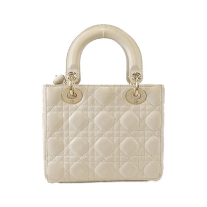 Christian Dior Gold Leather Handbag Rovelle Bags
