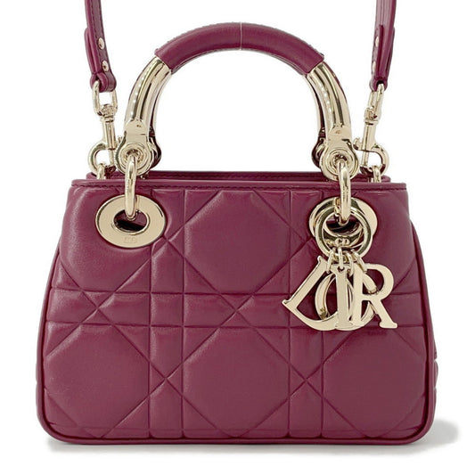 Christian Dior Bordeaux Champagne Gold Leather Handbag Rovelle Bags