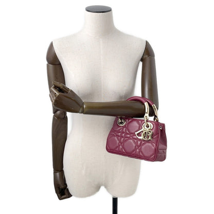 Christian Dior Bordeaux Champagne Gold Leather Handbag Rovelle Bags