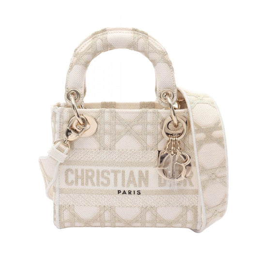 Christian Dior Gold White Canvas Handbag Canvas Rovelle Bags