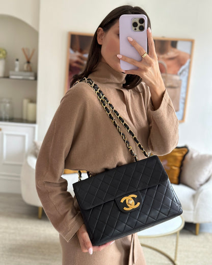 Chanel Black Maxi Mademoiselle Single Flap Bag in Lambskin with 24K Gold Hardware Rovelle Bags