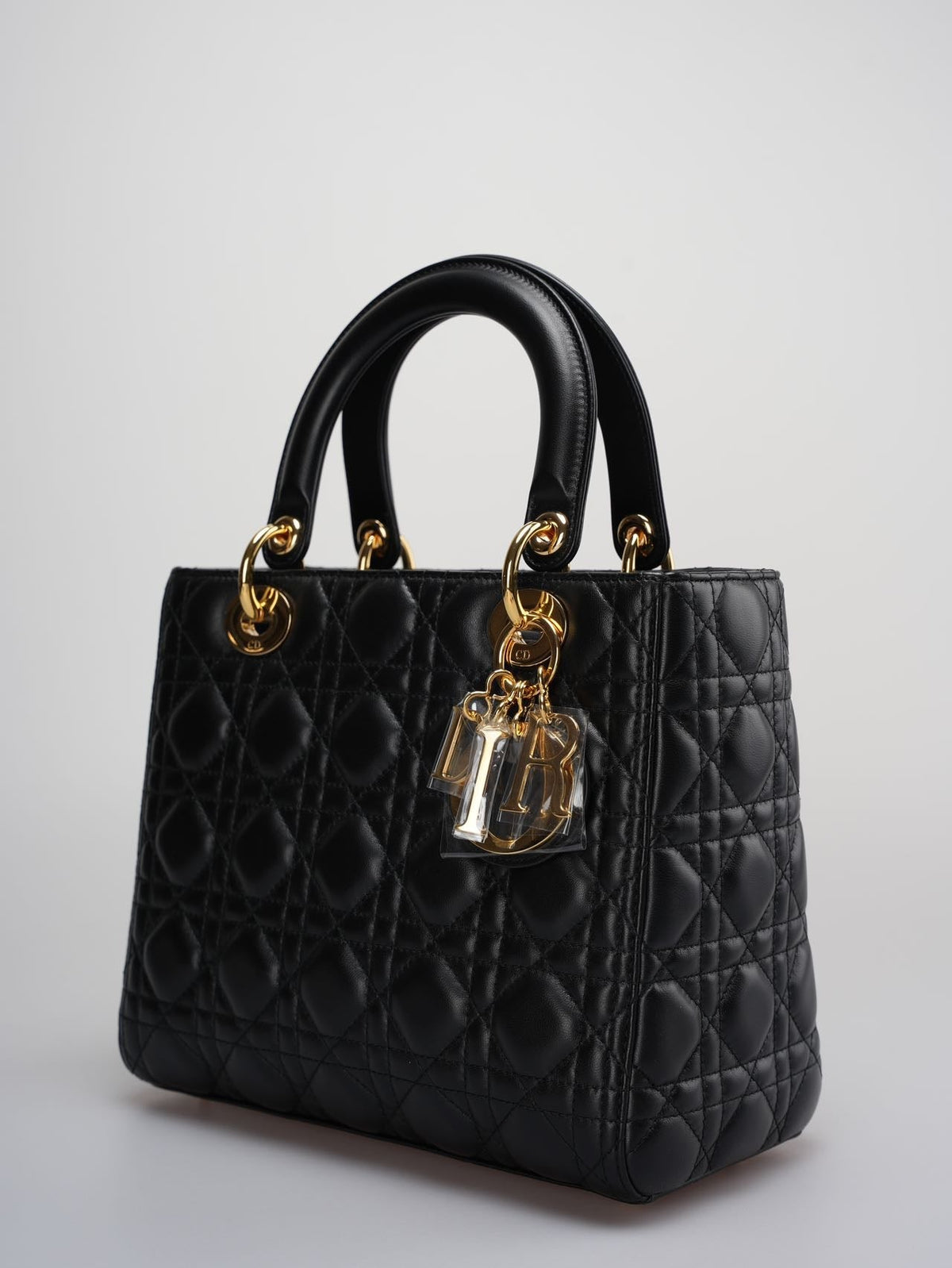 Christian Dior Black Medium Bag In Cannage Lambskin Leather With Gold Hardware Rovelle Bags