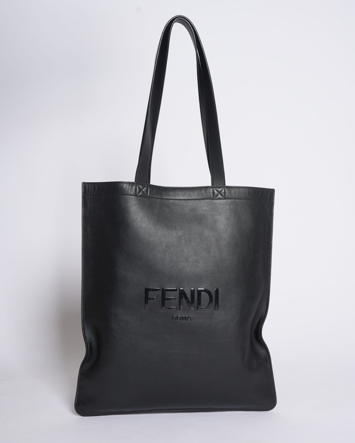 Fendi logo debossed shopper tote bag in black Rovelle Bags