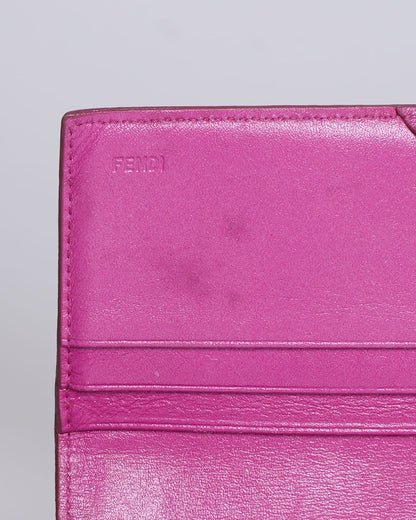 Fendi magenta leather logo flap continental wallet Rovelle Bags