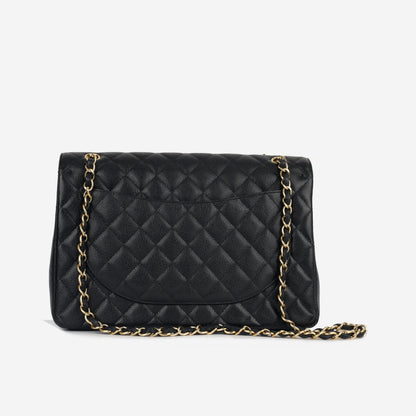 Chanel Maxi Classic Flap - Black Caviar Rovelle Bags