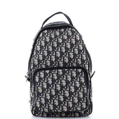 CHRISTIAN DIOR ZIP AROUND CANVAS BLUE OBLIQUE SLING BACKPACK Rovelle Bags