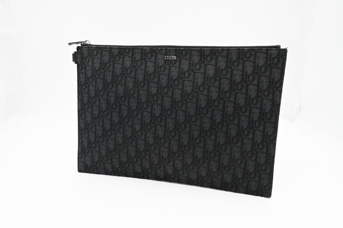 Dior Clutch in Black Oblique Canvas Rovelle Bags