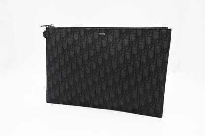 Dior Clutch in Black Oblique Canvas Rovelle Bags