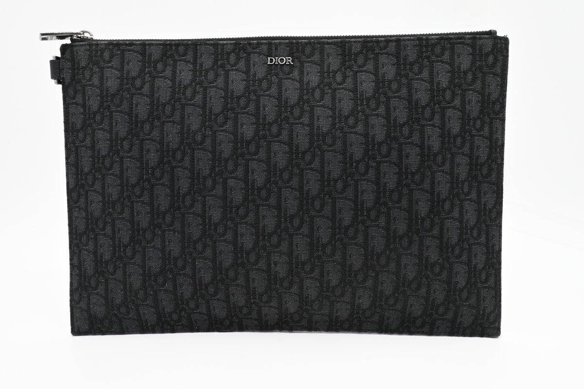 Dior Clutch in Black Oblique Canvas Rovelle Bags