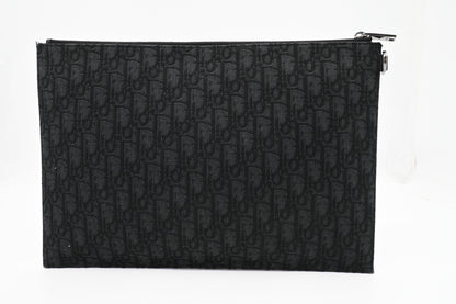 Dior Clutch in Black Oblique Canvas Rovelle Bags