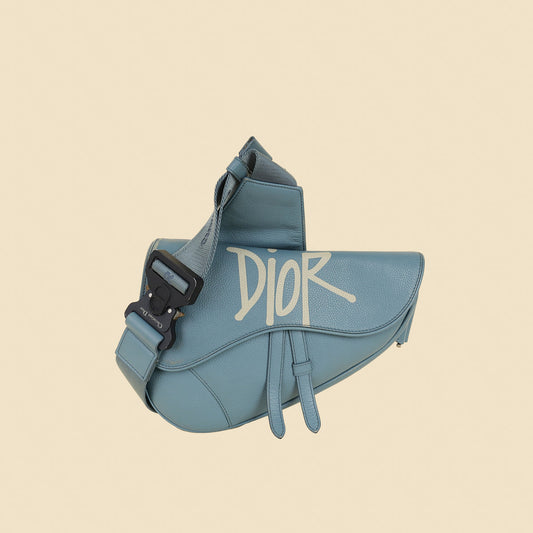 Christian Dior Blue X Shawn Stussy 2020 Logo Print Saddle Bag Rovelle Bags