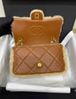 Chanel 24 Flap Bag Shearling Lambskin Gold-Tone Metal Beige Brown Rovelle Bags