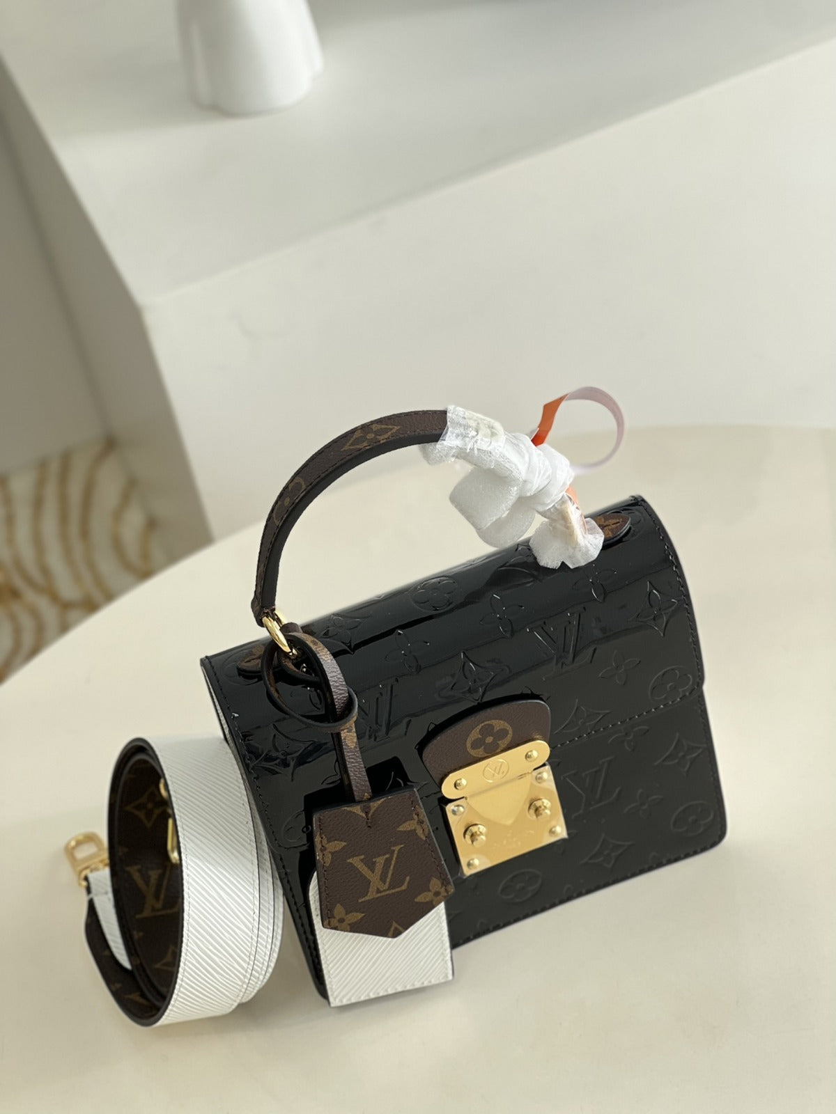 LOUIS VUITTON
Noir Monogram Vernis Leather Spring Street NM Bag