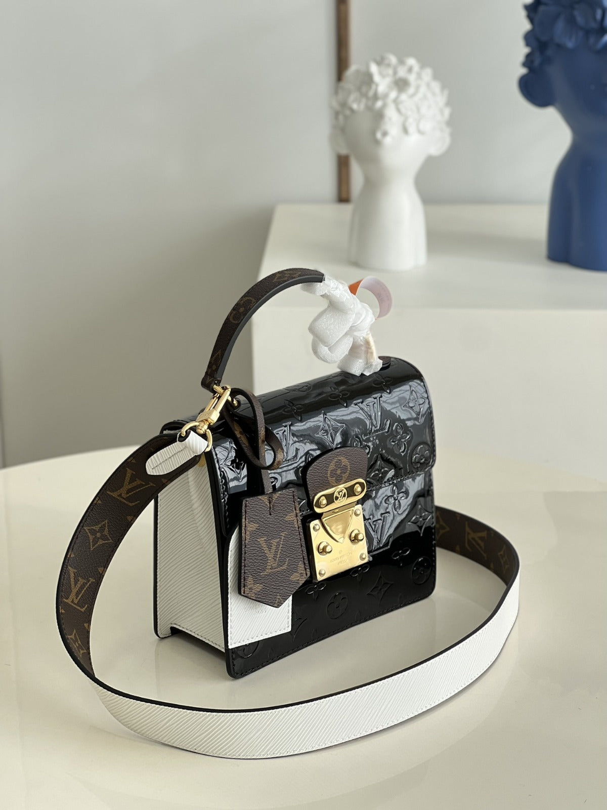 LOUIS VUITTON
Noir Monogram Vernis Leather Spring Street NM Bag