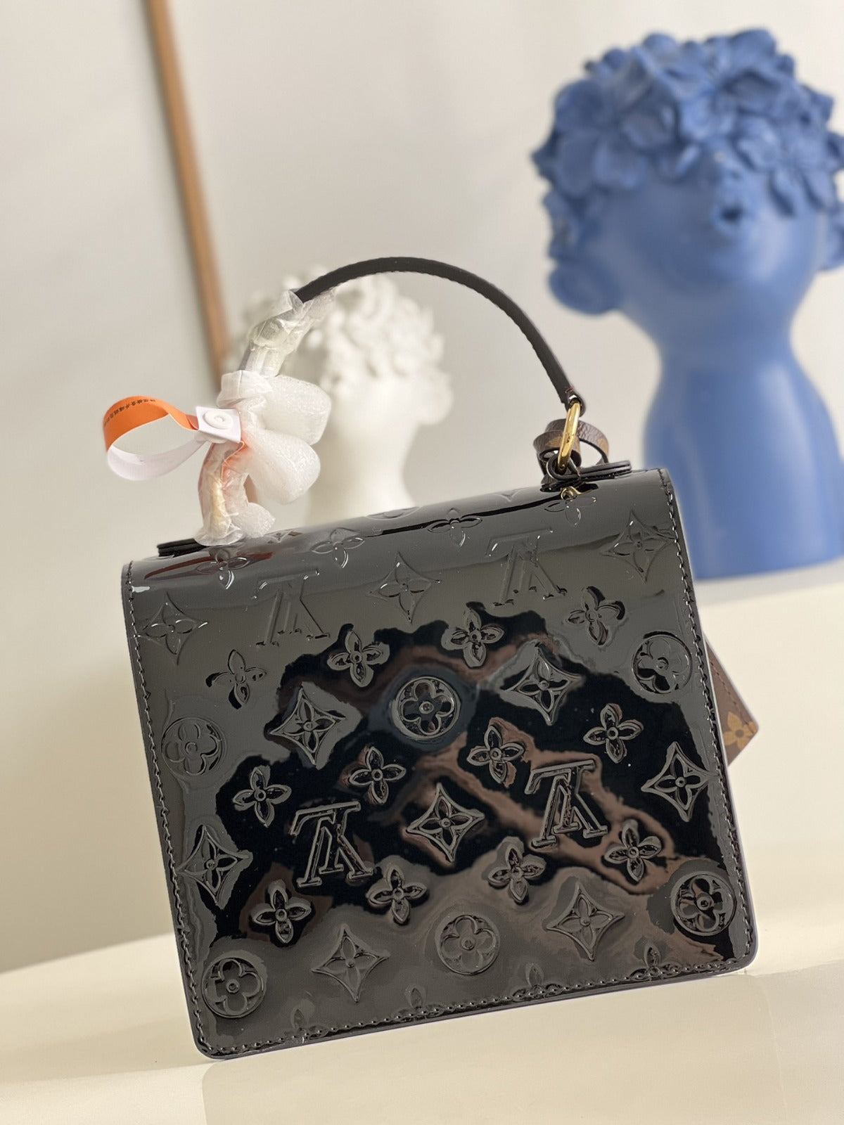 LOUIS VUITTON
Noir Monogram Vernis Leather Spring Street NM Bag