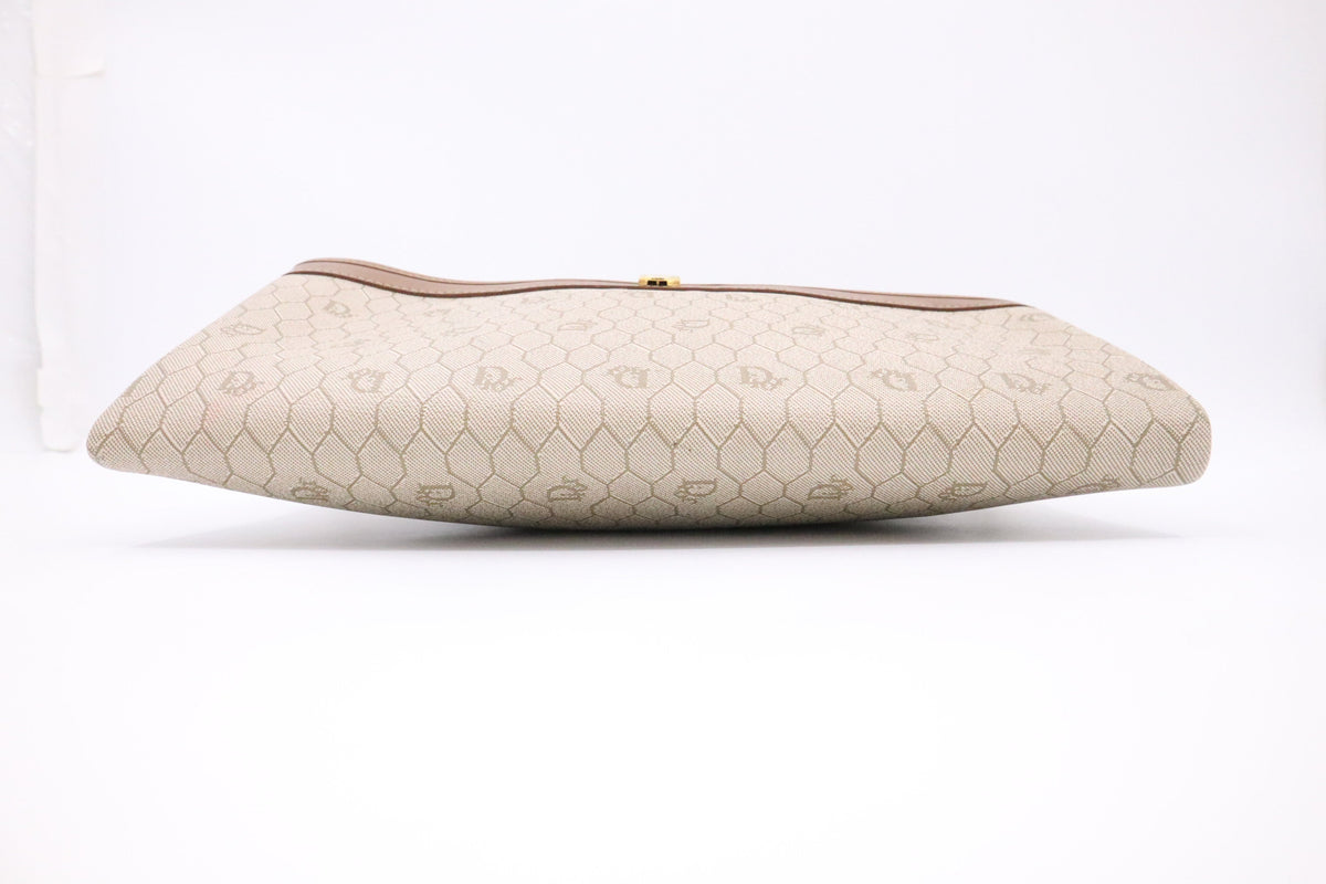Dior Clutch in Beige Hive Coated Canvas Rovelle Bags