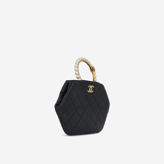 Chanel Pearl Crown Wristlet Clutch Rovelle Bags