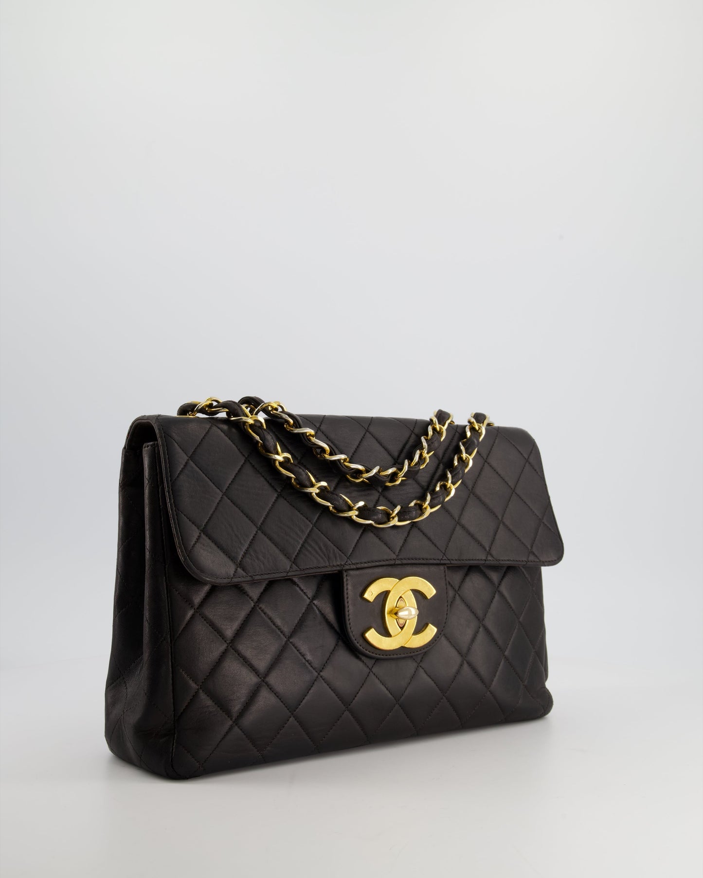 Chanel Black Maxi Mademoiselle Single Flap Bag in Lambskin with 24K Gold Hardware Rovelle Bags
