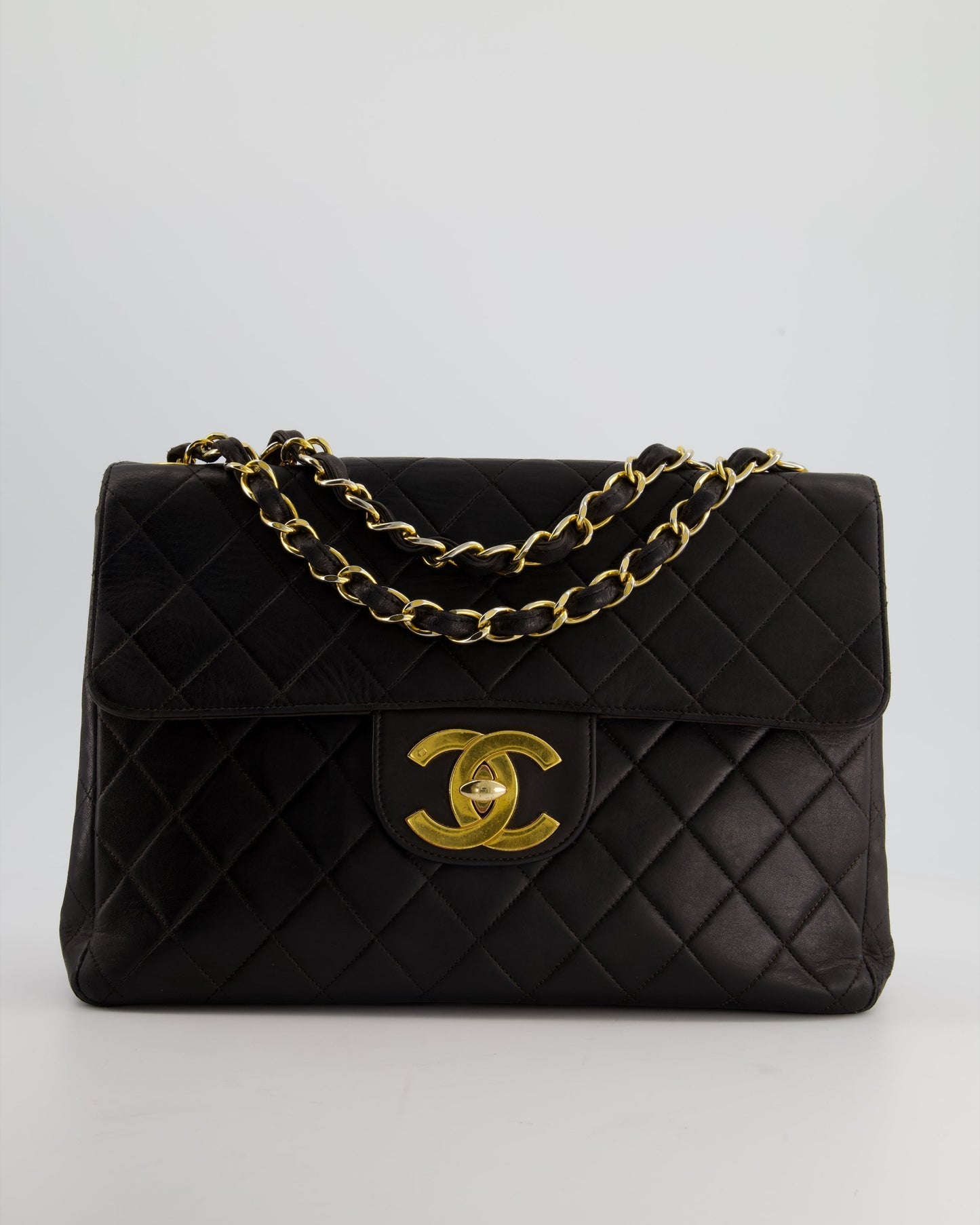 Chanel Black Maxi Mademoiselle Single Flap Bag in Lambskin with 24K Gold Hardware Rovelle Bags