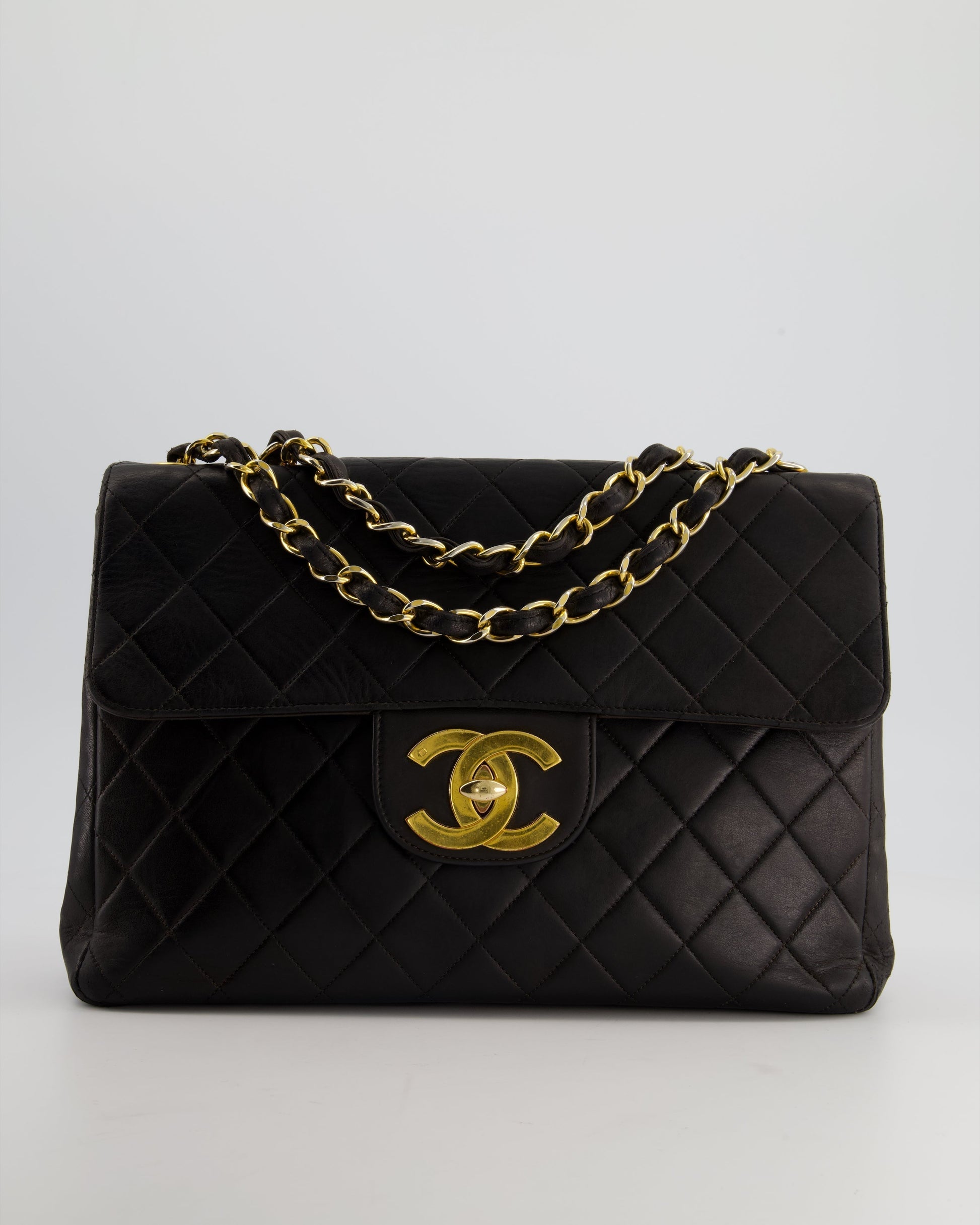 Chanel Black Maxi Mademoiselle Single Flap Bag in Lambskin with 24K Gold Hardware Rovelle Bags
