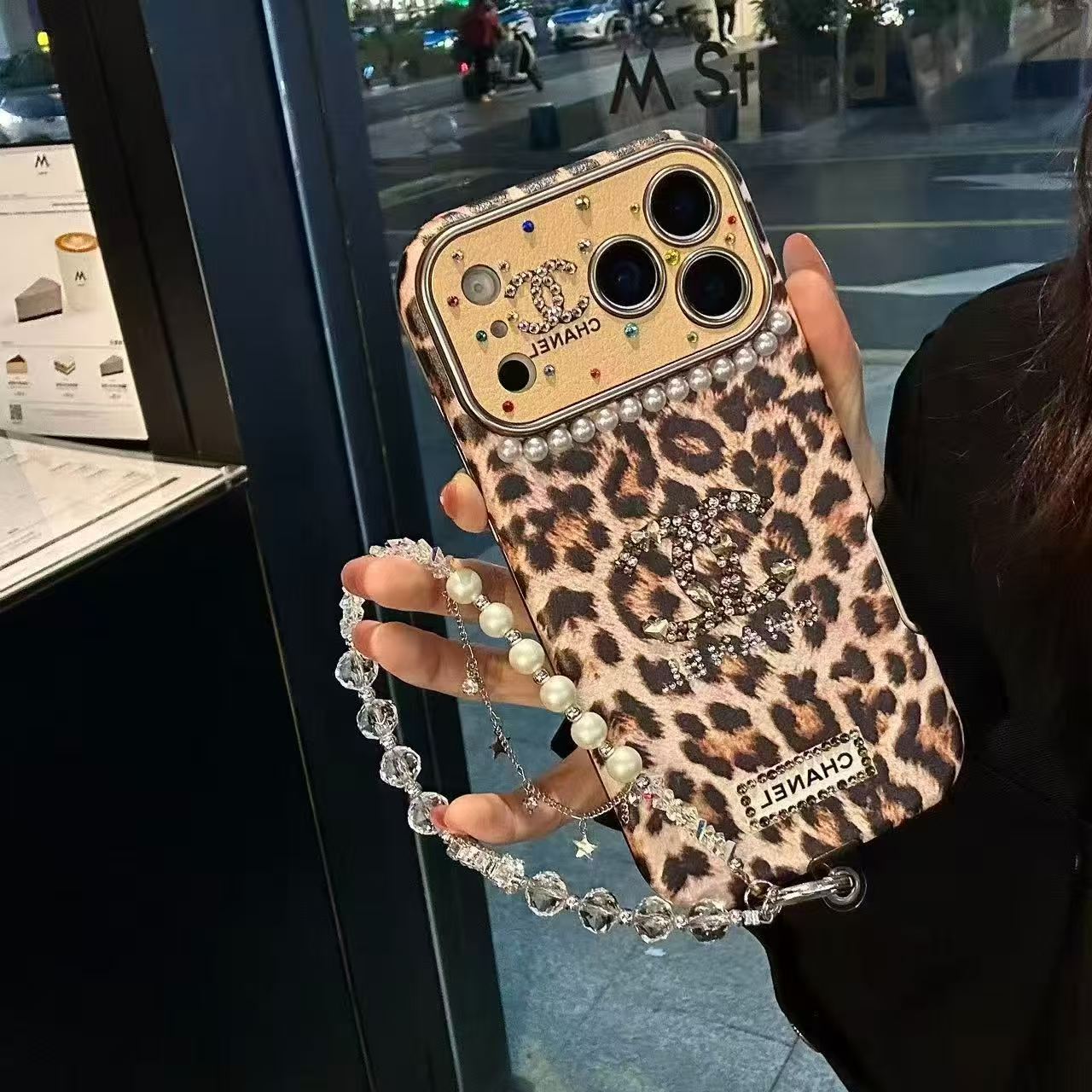 Leopard-print, pearl, and diamond iPhone case