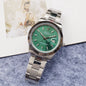 Rolex Datejust 40mm Green Dial Silver