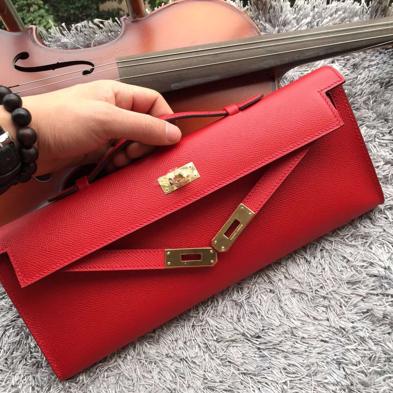 Luxury Hermes Red Handcrafted Kelly Cut Clutch