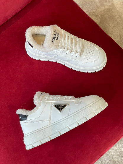 Prada Leather and Shearling  Sneakers