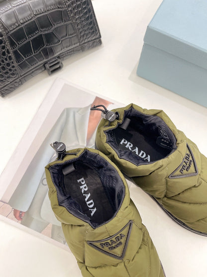 Prada  Paddled Nylon Slip on Shoes