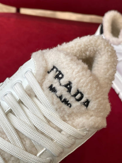 Prada Leather and Shearling  Sneakers