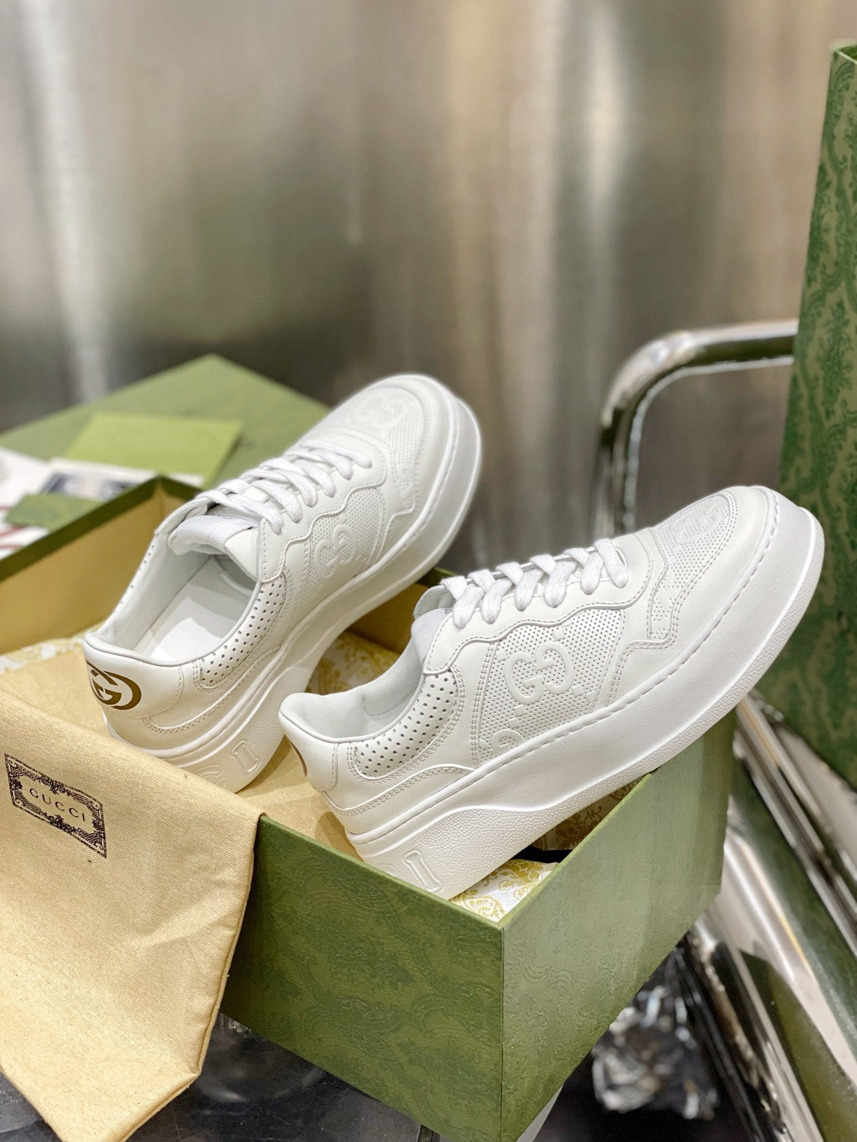 Gucci  GG Embossed Sneakers
