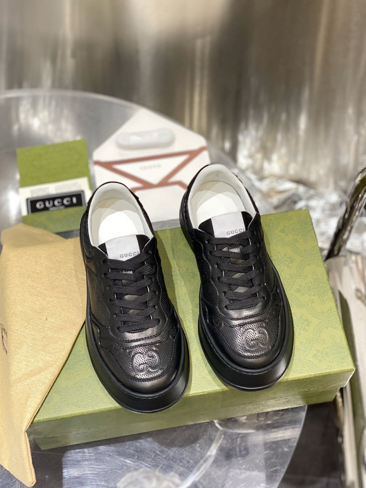 Gucci  GG Embossed Sneakers