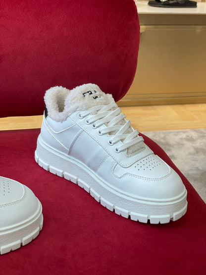 Prada Leather and Shearling  Sneakers