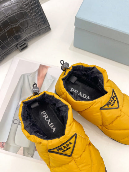 Prada  Paddled Nylon Slip on Shoes
