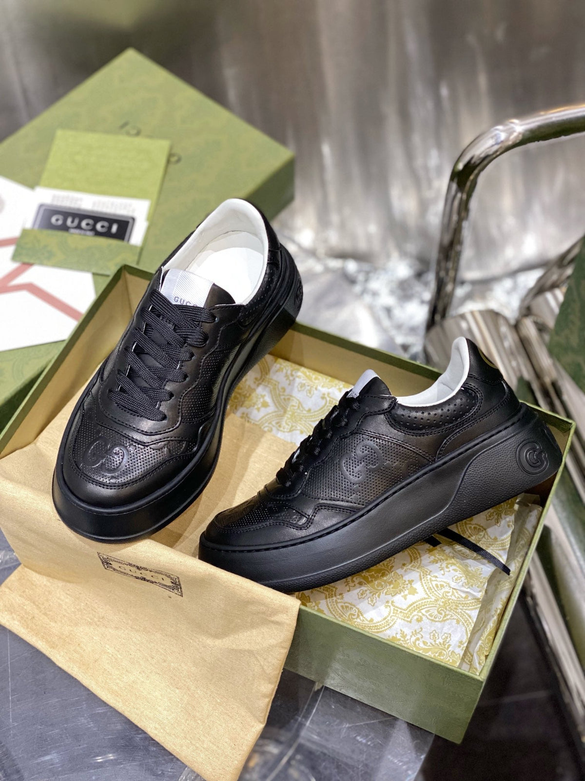 Gucci  GG Embossed Sneakers