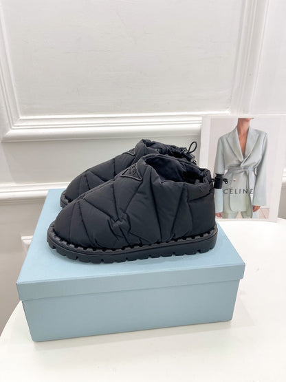 Prada  Paddled Nylon Slip on Shoes