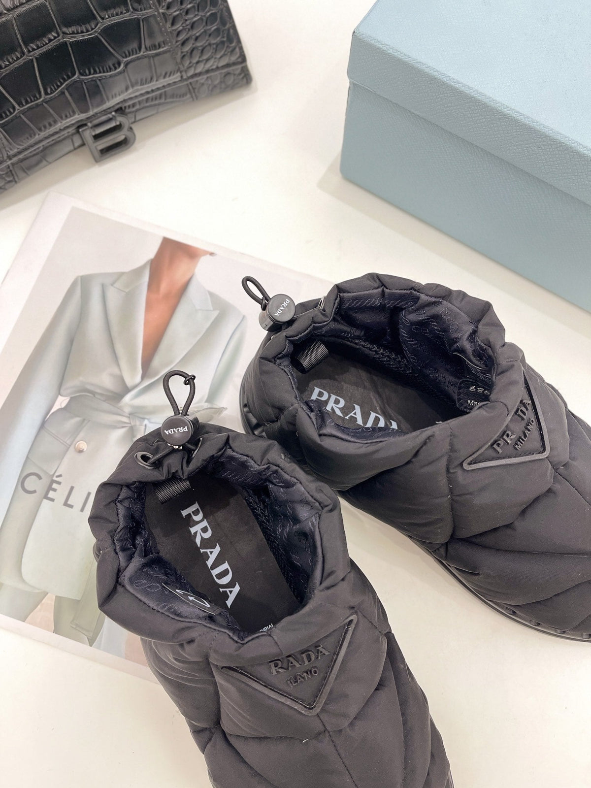 Prada  Paddled Nylon Slip on Shoes