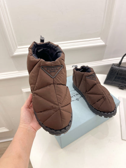 Prada  Paddled Nylon Slip on Shoes