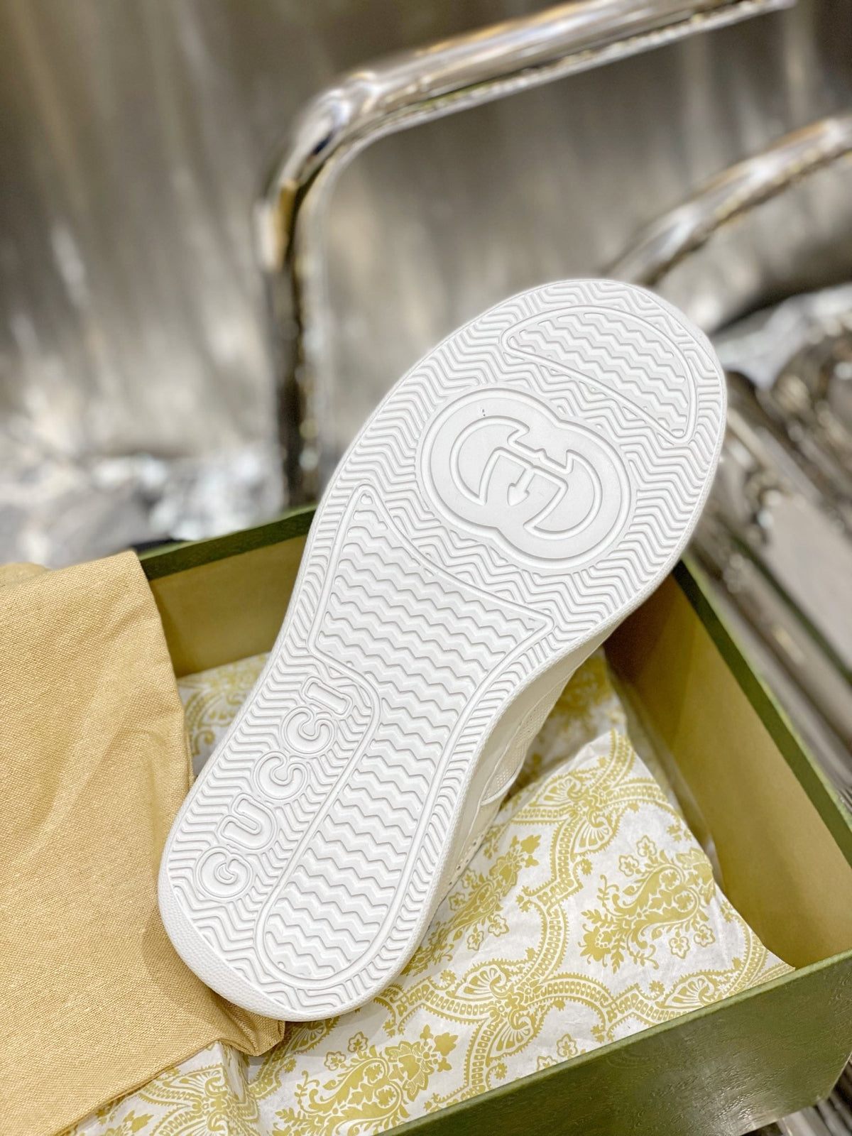 Gucci  GG Embossed Sneakers