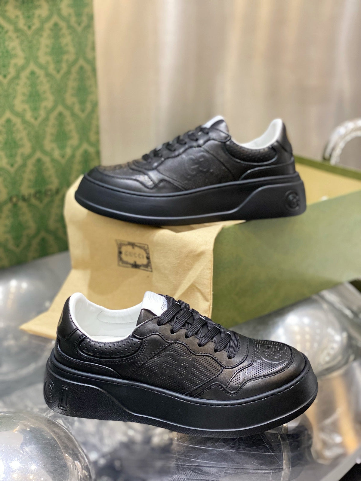 Gucci  GG Embossed Sneakers