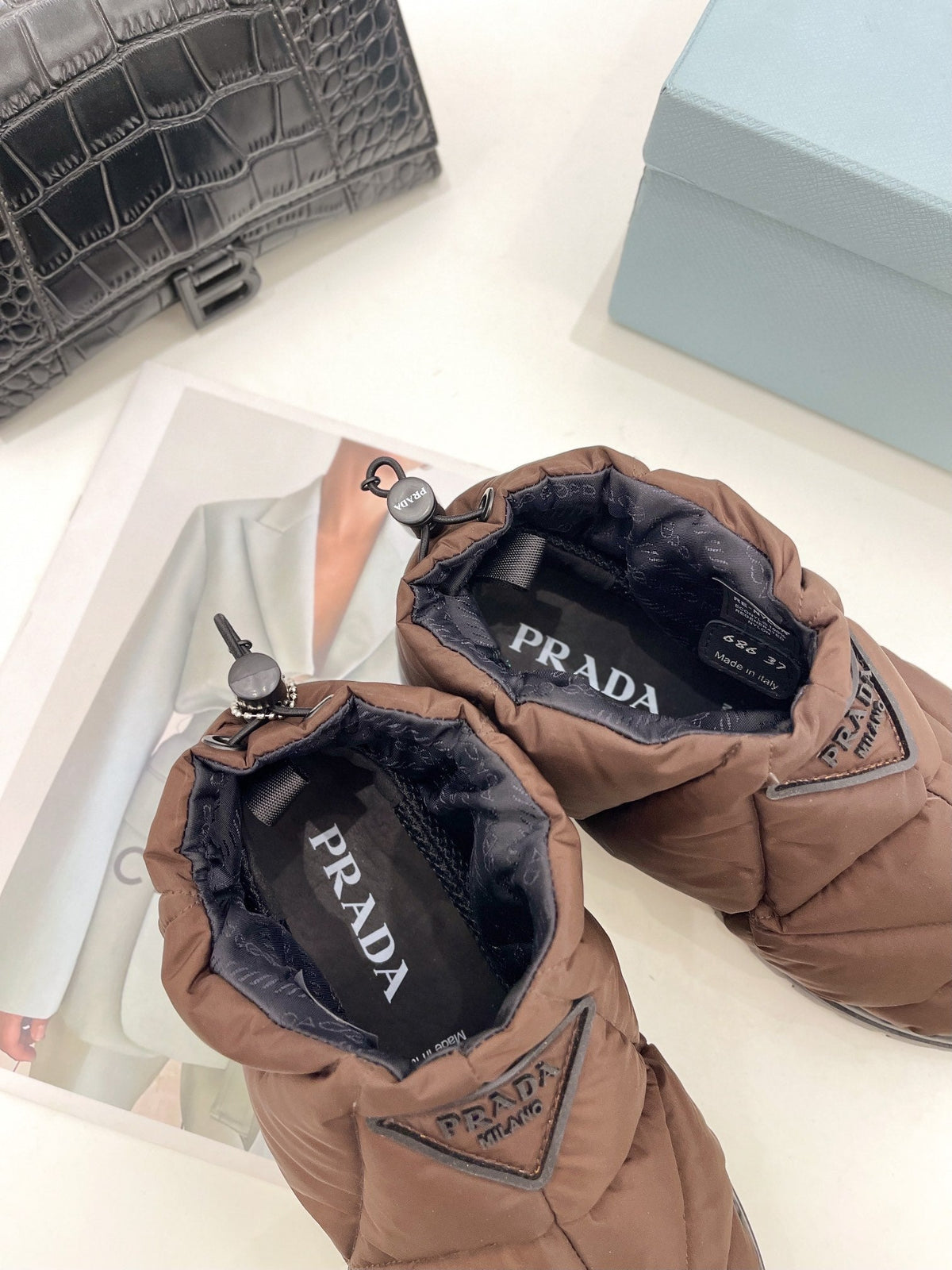 Prada  Paddled Nylon Slip on Shoes