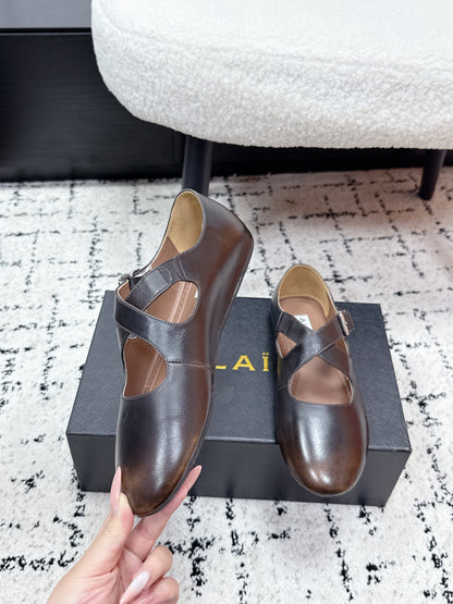 ALAIA 26S CROSS-STRAP BALLET FLATS IN DARK BROWN LAMBSKIN