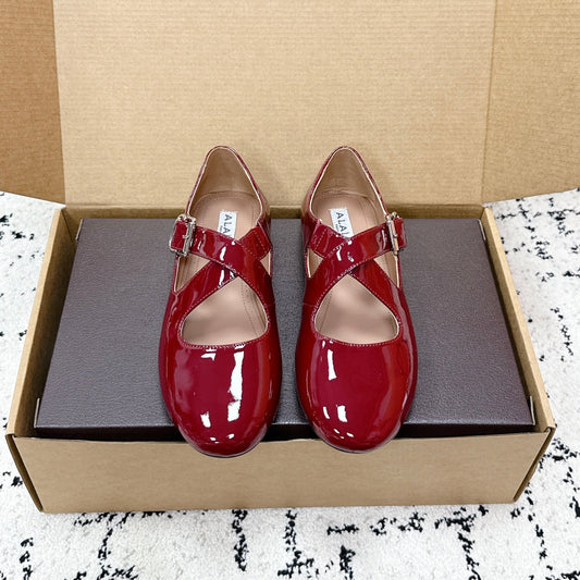 ALAIA 26S CROSS-STRAP BALLET FLATS IN RED GLOSSY LAMBSKIN