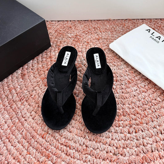ALAIA 26S HEELED THONG SANDALS IN BLACK VELVET