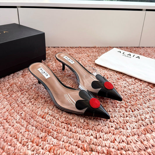 ALAIA 26S POINTED-TOE MULE HEELS IN BLACK LAMBSKIN AND TRANSPARENT PVC