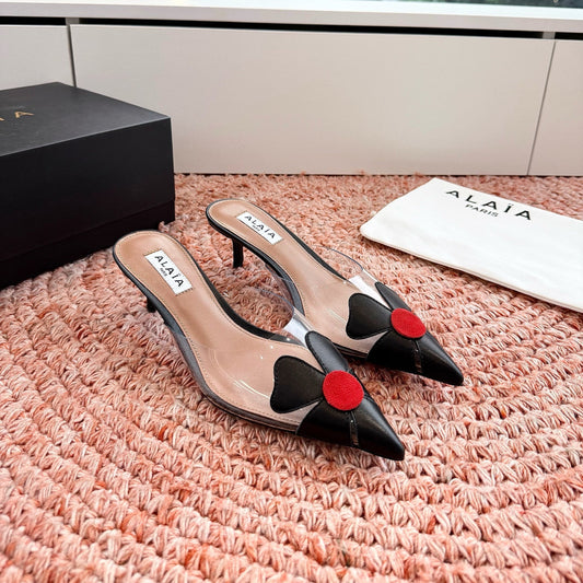 ALAIA 26S MULE HEELS IN BLACK LAMBSKIN AND TRANSPARENT PVC