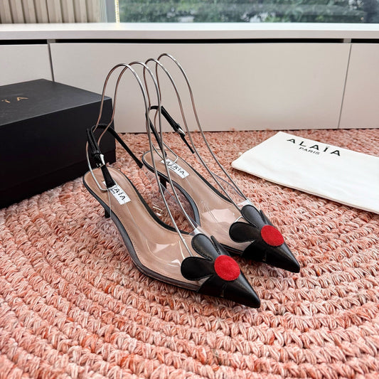 ALAIA 26S POINTED-TOE SLINGBACK HEELS IN BLACK LAMBSKIN AND TRANSPARENT PVC